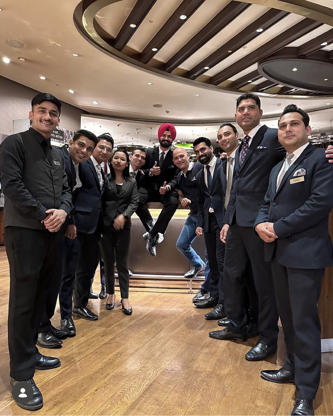 Pukhraj Bedi with a restaurant service team